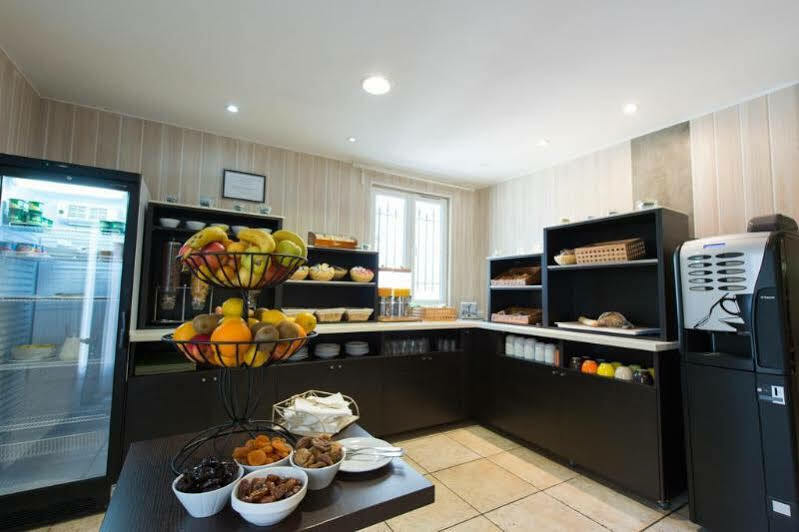 Grand Hotel Senia Orly Bagian luar foto